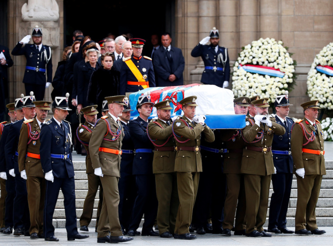 Grand Duke Jean’s casket being carried out of the cathedral after the ceremony. Photo: REUTERS/Francois Lenoir.